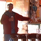 man standing in a saloon