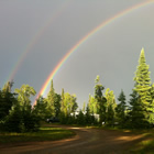 A beautiful double rainbow over the Hamm's site at Falcon Lake, Manitoba, after a thunderstorm.