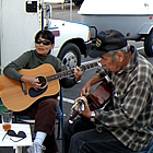 Rvers playing guitar together