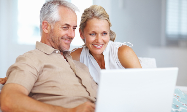 Mature couple with laptop