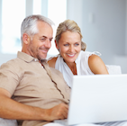 Mature couple with laptop