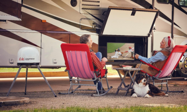 people sitting in front of their RV