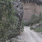 road going through a canyon area