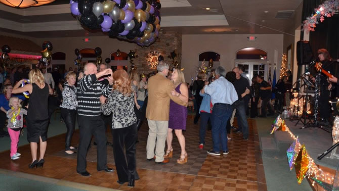 Group of people dancing in ballroom