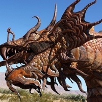 A steel-welded sculpture of a serpent head.