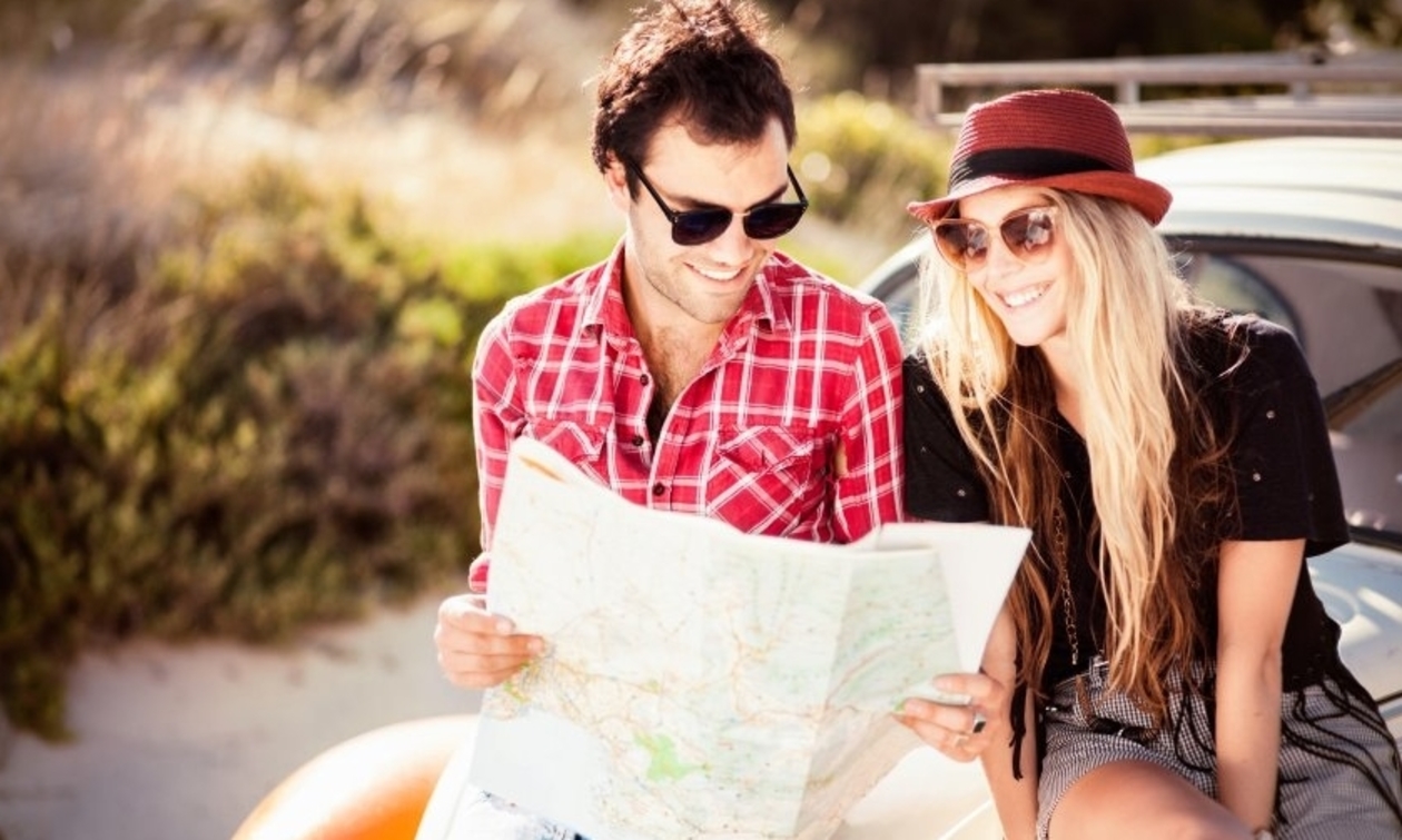 Man and woman looking at a road map