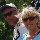 Man, woman and child on a mountain.