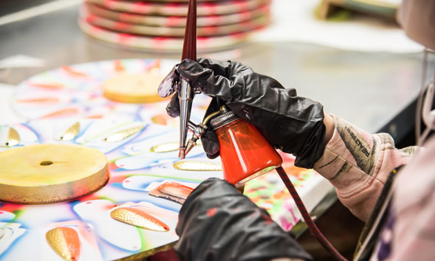 In the worldwide race to high-speed mechanization, Len Thompson Lures haven’t let go of the hands-on touch—each lure is hand-painted.