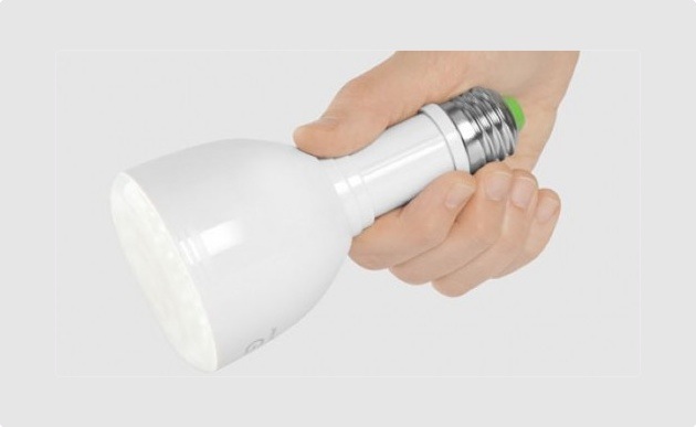 A hand holding the flashlight.