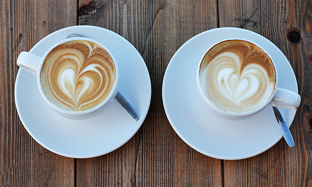 two cups of coffee at a coffee shop