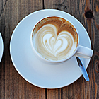 two cups of coffee at a coffee shop