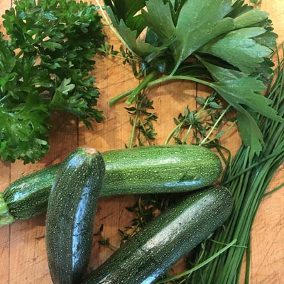Array of herbs and vegetables.