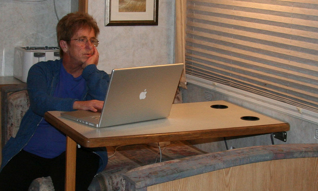Woman using an Apple computer