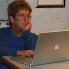 Woman using an Apple computer