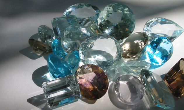 gemstones laid out on a table