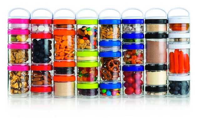 A group of colourful GoStack containers filled with a variety of items.  