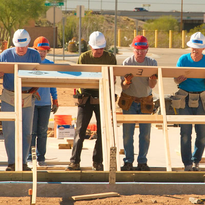 Volunteers building home. 