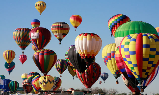 Pictured here is a sky full of colourful hot-air balloons at the International Balloon Fiesta in Albuquerque.