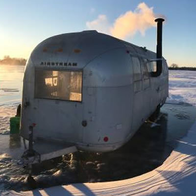 Picture of Airstream trailer converted into an ice house. 