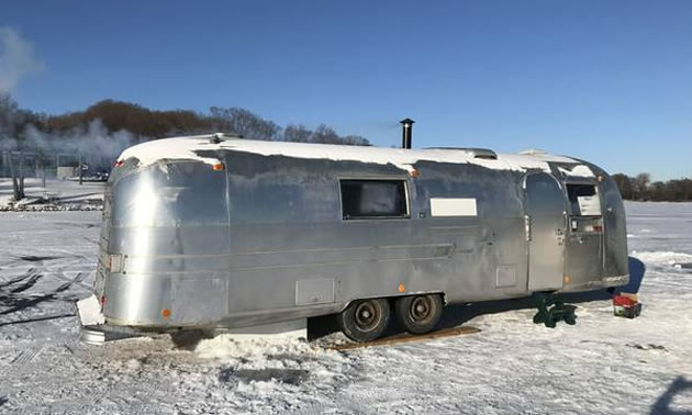 Picture of Airstream trailer converted into an ice house. 