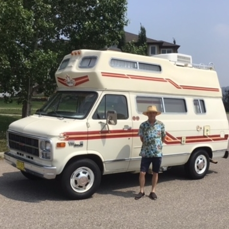 Randy Welsh standing in front of his vintage camper van