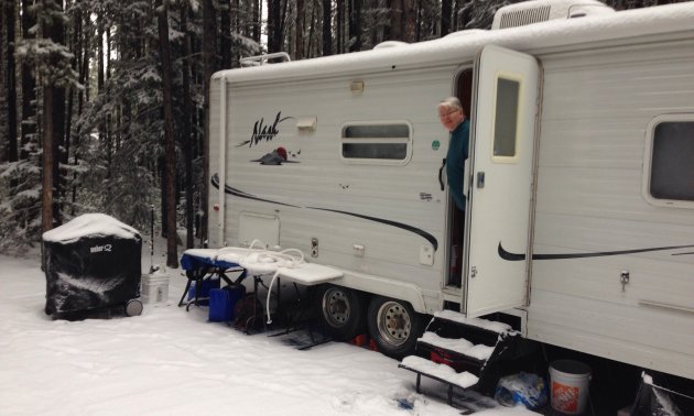 The photo is of our RV, with my wife Sandy looking out of the trailer door. This photo was taken September 9/9/2014. If you're not happy with the weather, wait for a few minutes and it will change.