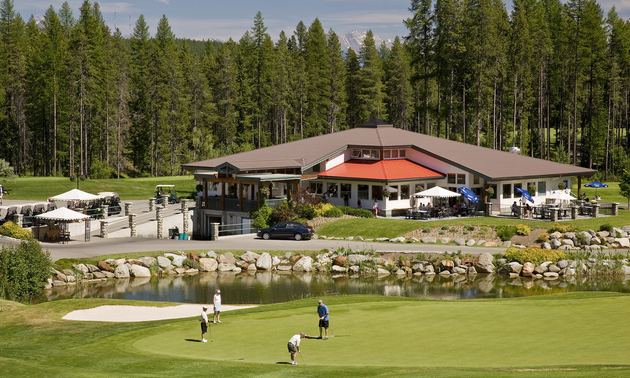 Trickle Creek Golf Course has tree-lined fairways and mountains in the background.