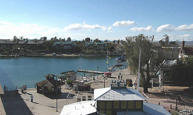 Lake Havasu City beach with buildings and boats alongside it