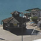 Lake Havasu City beach with buildings and boats alongside it