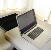 Photo of a laptop on a countertop of an RV.