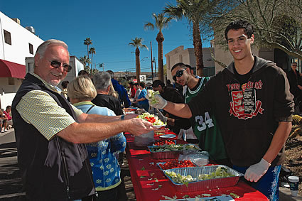 People line up at the salad bar during Yuma Lettuce Days