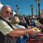 People line up at the salad bar during Yuma Lettuce Days