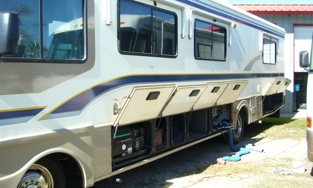 RV with storage sections open