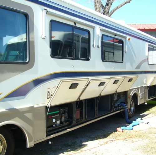 RV with storage sections open