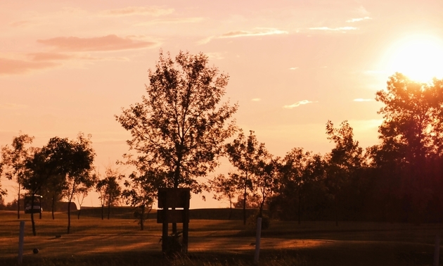 Shown is a sunset over the Manitou Beach Golf Club in Manitou Beach, Saskatchewan.