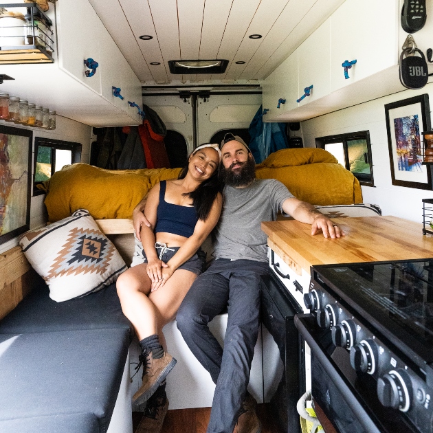 Meghan and Matt sitting in their van together