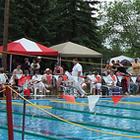 people around a swimming pool