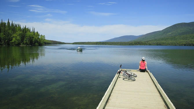 Picture of person sitting on dock.