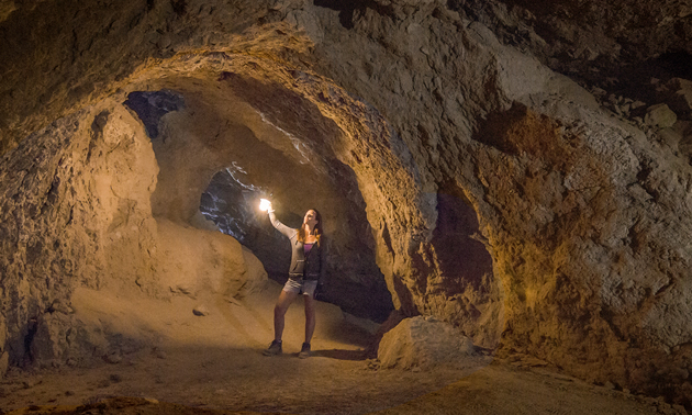 Jena in awe of mud caves in San Diego County.