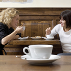 ladies enjoying a coffee at a coffee shop