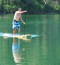 A man on a paddleboard.