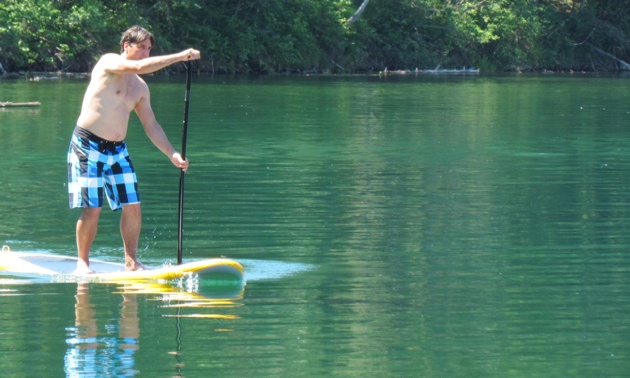 A man on a paddleboard.