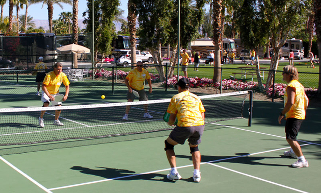 Participants in the Sunshine Invitational Charity Event in Indio, California, play pickle-ball to raise money for cancer research.