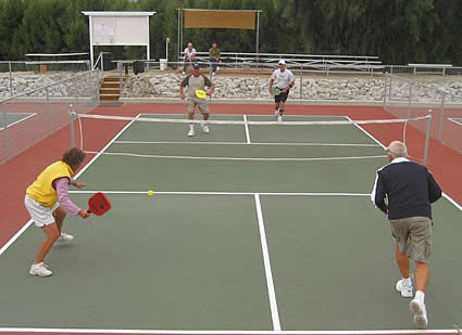 People playing Pickleball