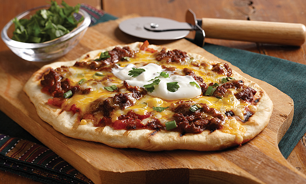 pizza on a cutting board