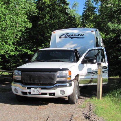 Our Cougar 5th wheel parked at a site at Rainbow Falls Prov. Park