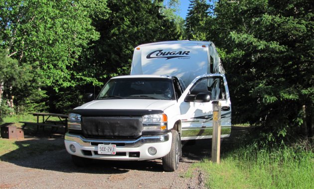 Our Cougar 5th wheel parked at a site at Rainbow Falls Prov. Park