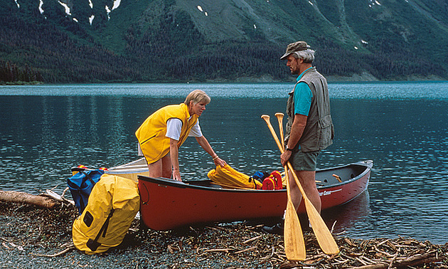 people getting into a boat