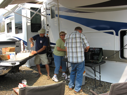 Fifth wheel RV in front of mountains