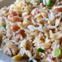 A close up photo of fried rice.